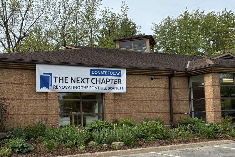 Exterior of the Fonthill Branch with a banner that read The Next Chapter: Renovating the Fonthill Branch: Donate Today.