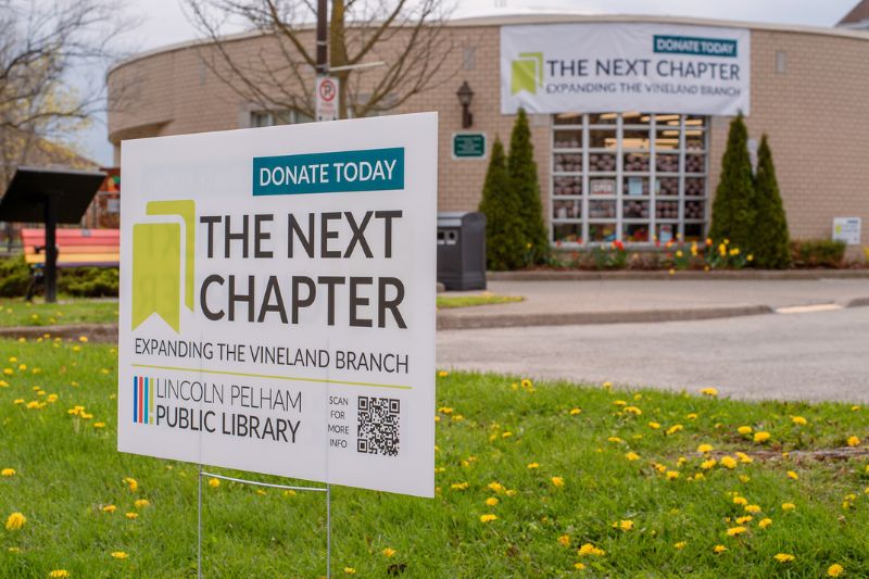 The Next Chapter Vineland Yard Sign in front of Rittenhouse Branch